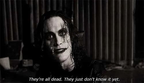 Man with goth-style hair and makeup saying: They’re all dead. They just don’t know it yet.